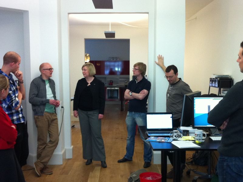 A development team reviewing evidence together in a meeting