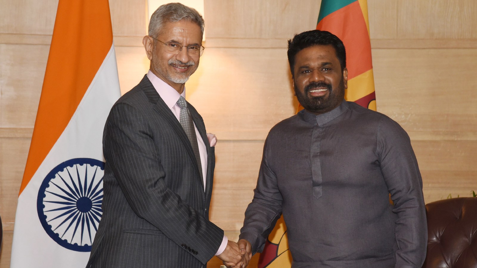 Policy officials gathered in a Sri Lankan government meeting room
