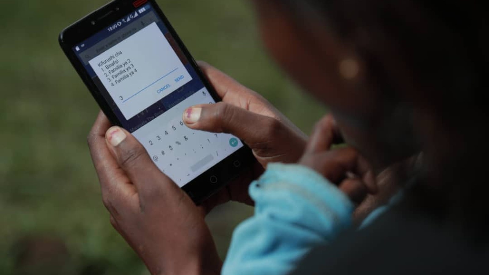 Person using a mobile phone for digital services